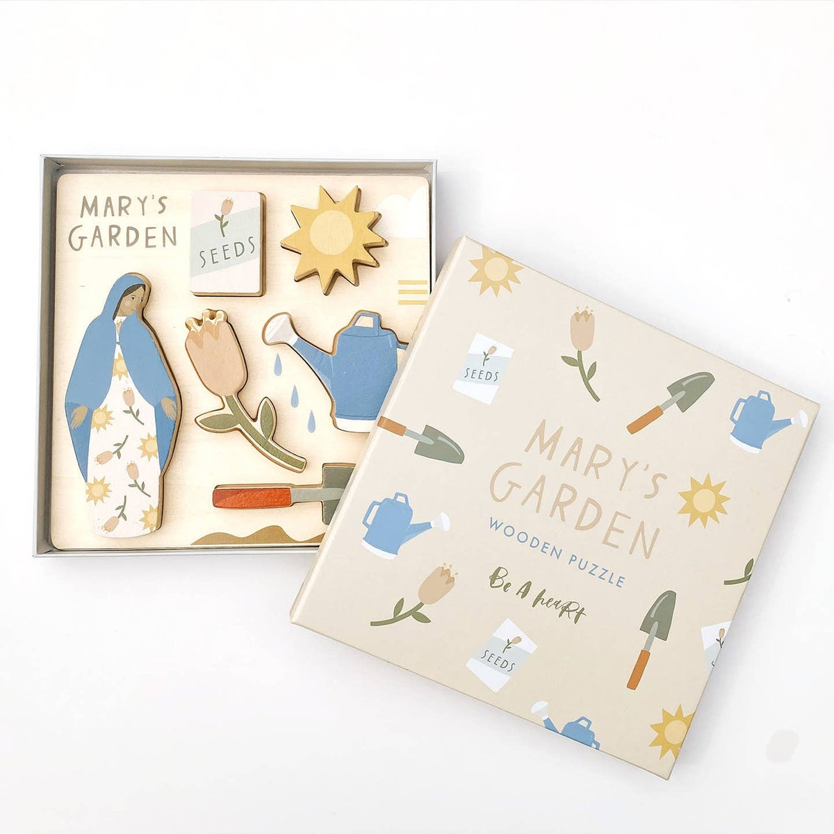 Wooden puzzle set with garden-themed pieces and 'Mary's Garden' packaging on a white background