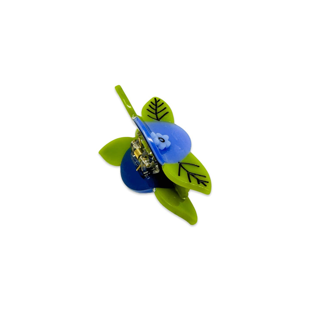 Colorful turtle-shaped clip with green shell and blue top on a white background