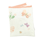 Baby blanket with butterfly and flower patterns on a white background