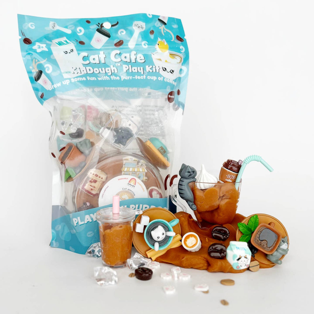Cat-themed play kit with toys and packaging on a white background
