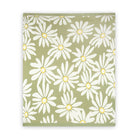 Floral patterned fabric with white flowers on a green background