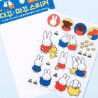 Sheet of cartoon rabbit stickers with colorful clothing on a light blue background.