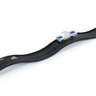 Model of a race car on a track with a white background