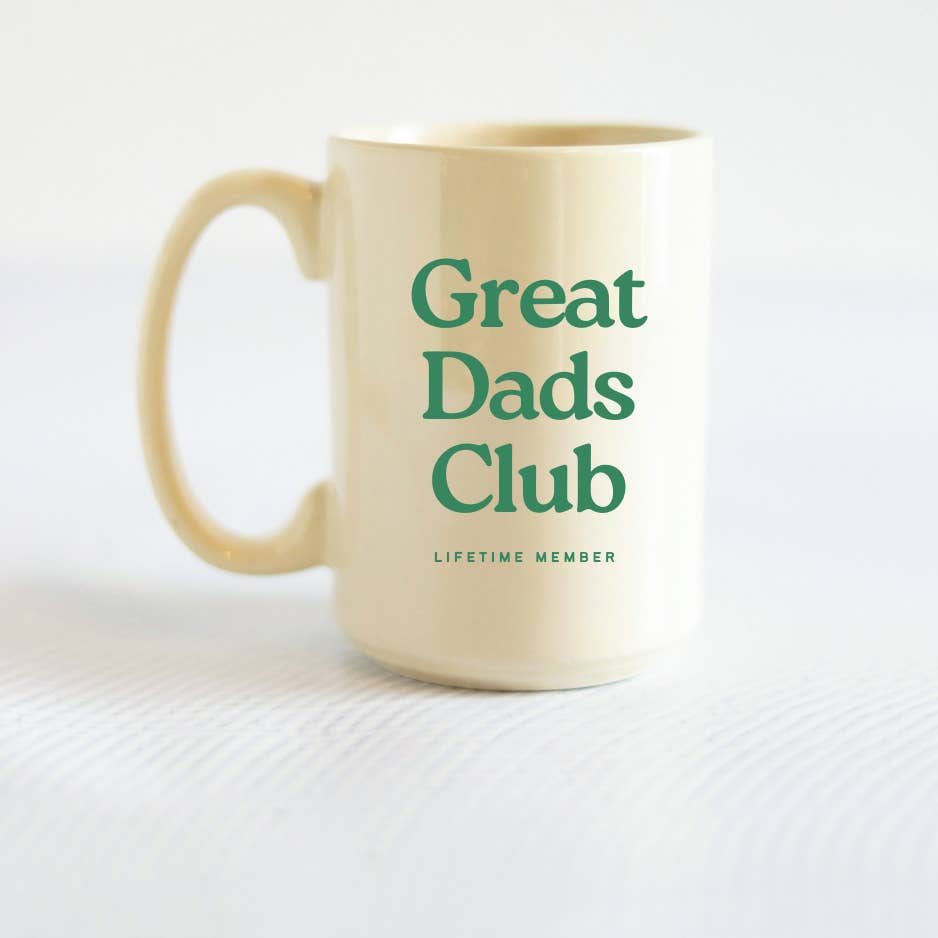 Beige mug with 'Great Dads Club Lifetime Member' text on a white background