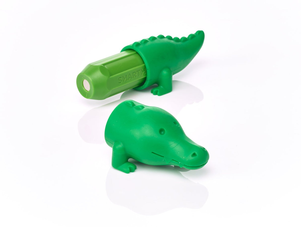Two green alligator-shaped objects on a white background