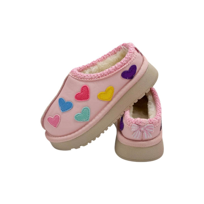 Pink children's slippers with colorful heart designs on a white background