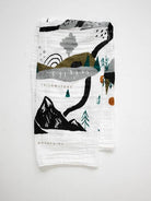 Pack of socks with mountain design on a white background