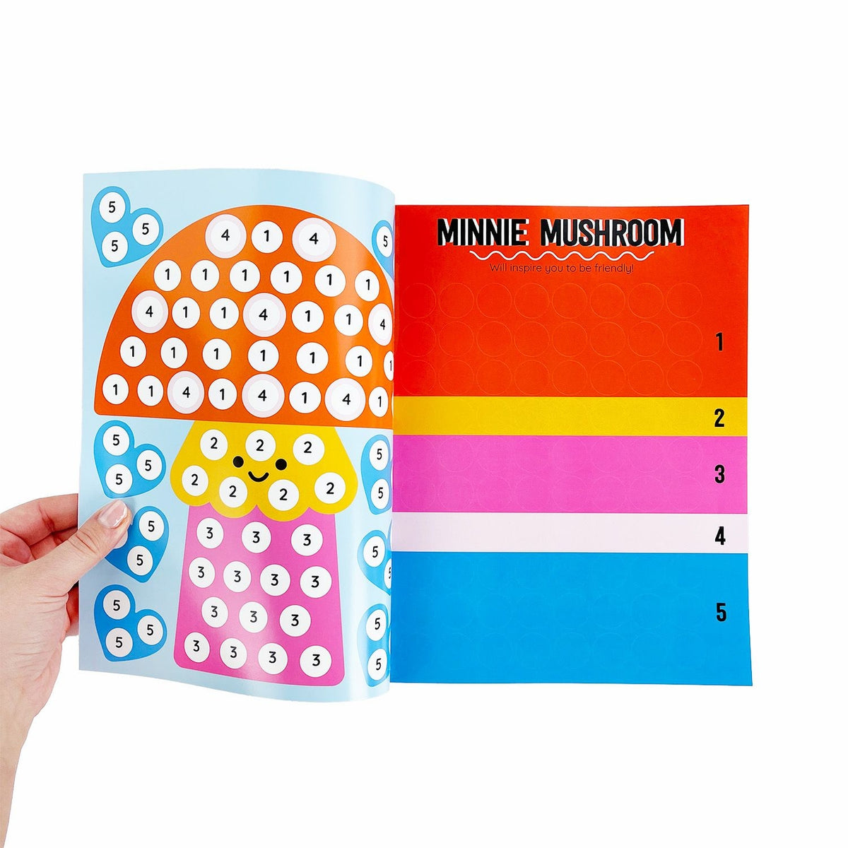 Colorful stationery items including a notebook and stickers shaped like a mushroom.