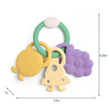 Teething ring with colorful charms on a white background