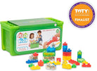 The product image displays the Jelly Blox Stash 'n' Stack toy set by Continuum Games, featuring a purple circular badge in the top right corner indicating it as a Toy of the Year (TOTY) Awards 2025 Finalist.

It includes a bright green rectangular storage box with a translucent lid and a product label on the front, alongside several colorful, translucent squishy building blocks and sensory pieces arranged in front of it on a white background.