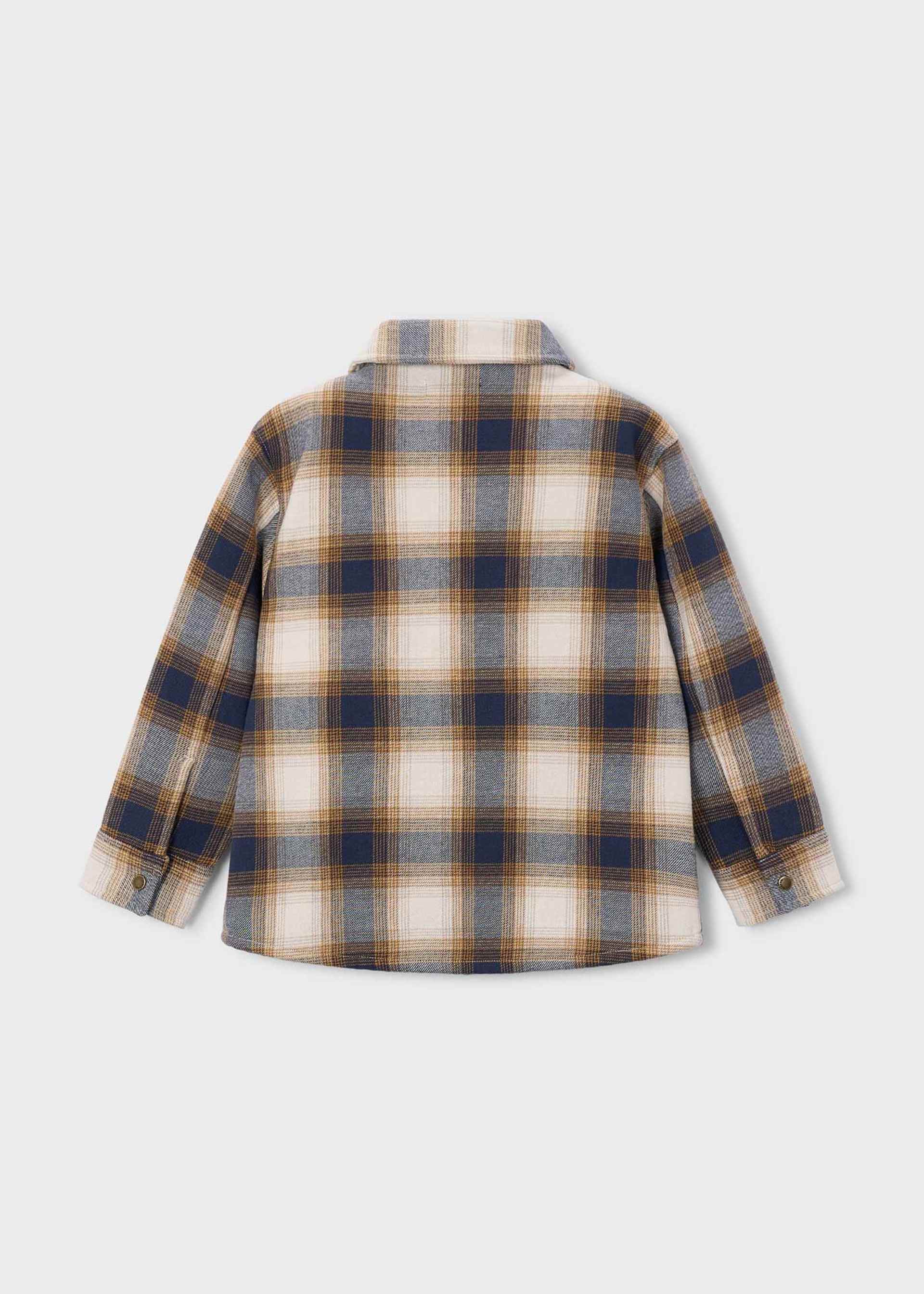 A long-sleeve plaid button-up shirt shown from the back, featuring a pattern of navy blue, tan, and cream on a light gray background.