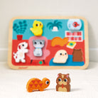 Wooden puzzle with colorful animal figures on a white background