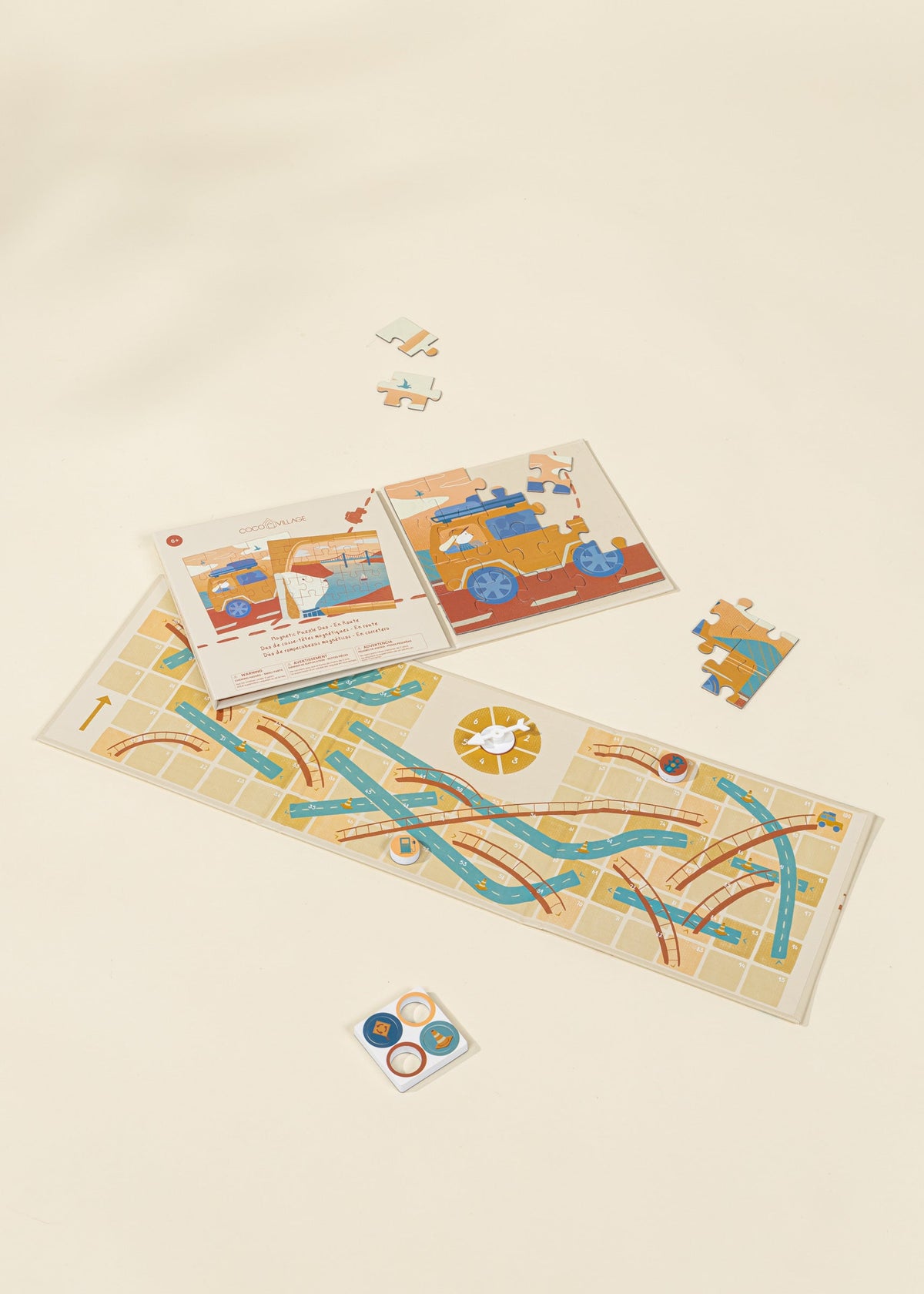 Children's educational puzzle with cards and pieces on a beige background