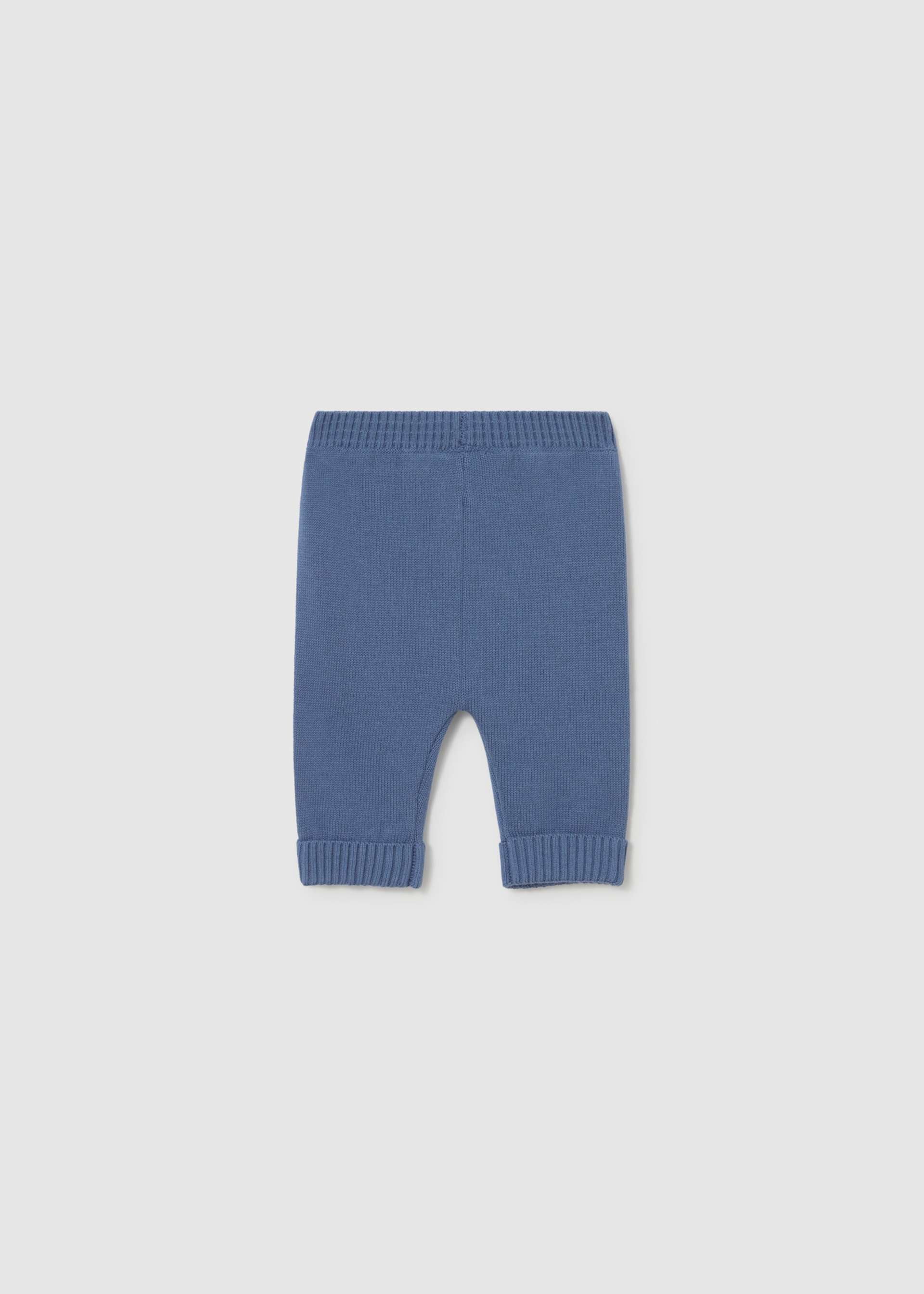 Blue baby pants on a light gray background