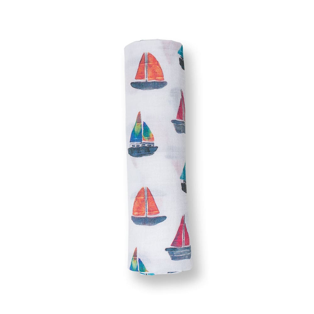 Swaddle blanket with sailboat pattern on a white background