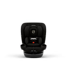 A black infant car seat with a five-point harness, side cup holders, and a circular silver logo on the headrest, shown from a front-facing perspective on a white background.
