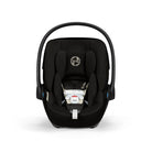 Black baby car seat with a visible brand logo on a white background