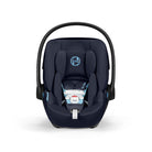 Navy blue baby car seat with a visible brand logo on a white background