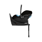 Black baby car seat with a stand on a white background