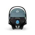 Baby car seat with canopy on a white background