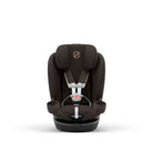 A premium dark brown baby car seat with a black base, featuring a gold circular logo on the headrest and a silver metal harness buckle system, shown against a plain white background.