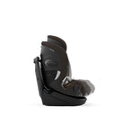 A side profile view of a BabyJourney car seat in dark brown and black, shown against a solid white background.