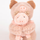 Plush pig toy on a white background