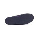 Navy blue shoe sole on a white background