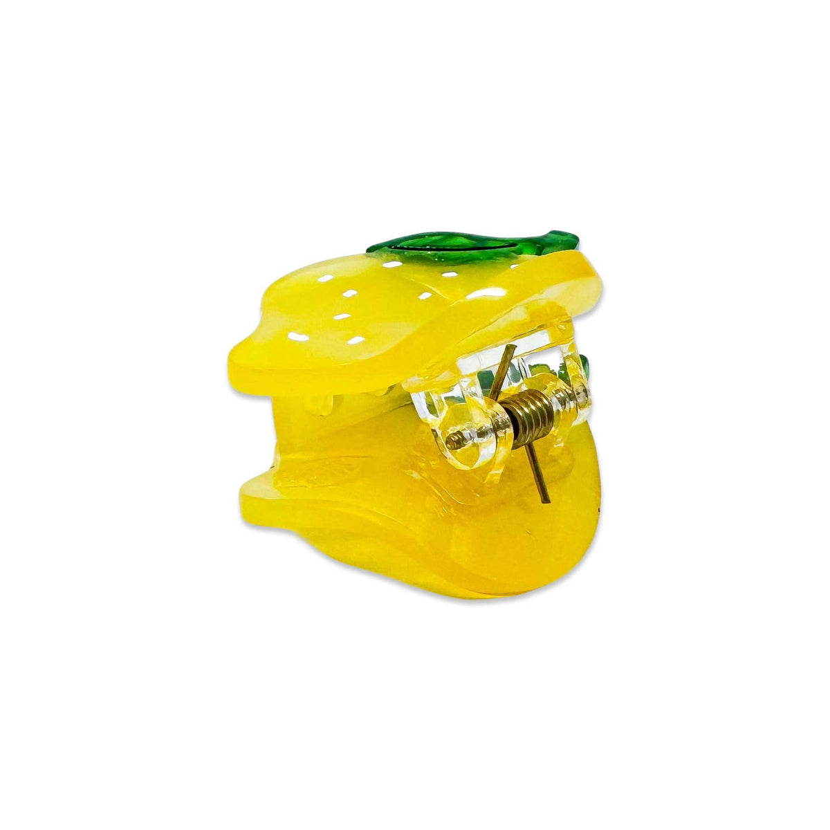 Yellow lemon-shaped object with a green top on a white background