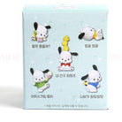 Box of cartoon character figurines with Korean text on a light blue background