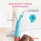 Blue finger brush for cleaning and soothing gums with text and oogiebear branding.