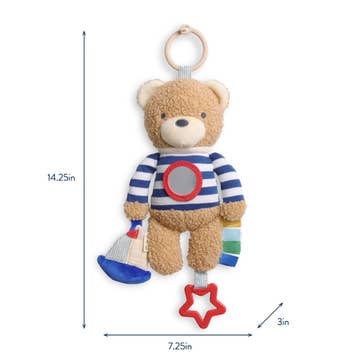 Teddy bear toy with striped shirt and sailboat, dimensions indicated on a white background