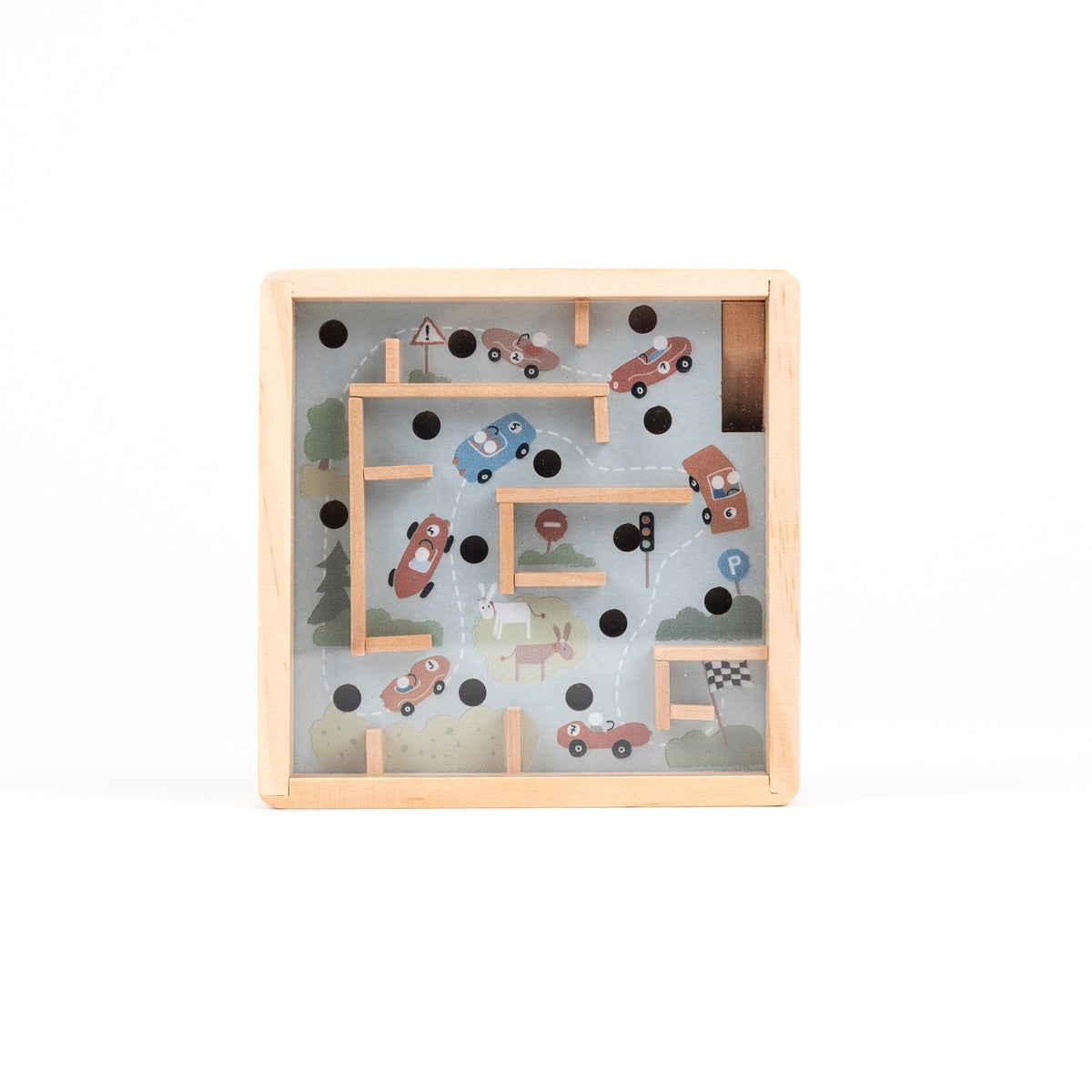 A square wooden toy maze with a light natural wood frame and a clear top panel showing colorful illustrated cars, roads, trees, and road signs on a white background.