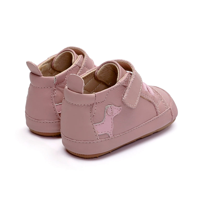 A pair of baby high-top shoes in light pink faux leather, featuring a hook-and-loop strap closure and a pink dog silhouette applique on the side, shown against a plain white background.