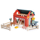 Wooden Big Red Barn Playset by Mentari displayed on a clean white background, showcasing the complete set including the two-story red and green barn, opening double doors, a working pulley system with a yellow magnetic hay bale, wooden fence sections, a blue ladder, and small wooden animal figures including a cow, horse, pig, sheep, goat, chicken,