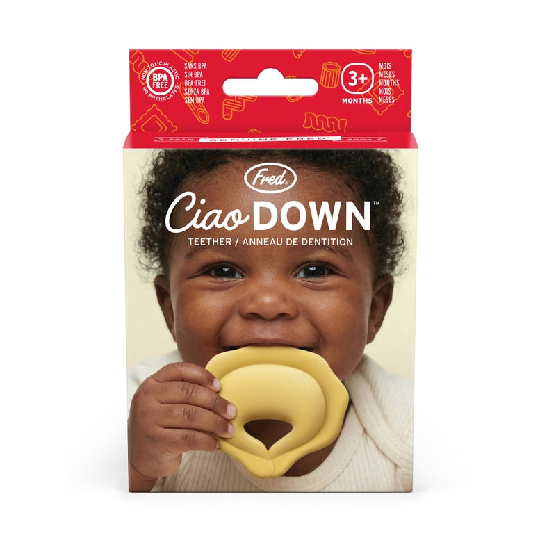 Boxed product for the Fred's Ciao DOWN teether, featuring a smiling baby holding the yellow silicone teether on the front of the packaging.