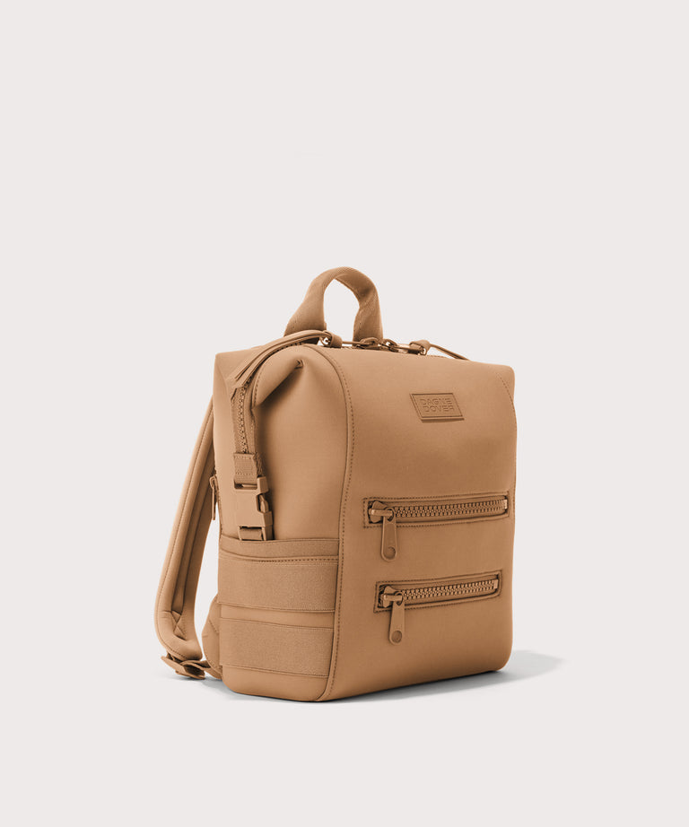 Tan backpack on a light gray background