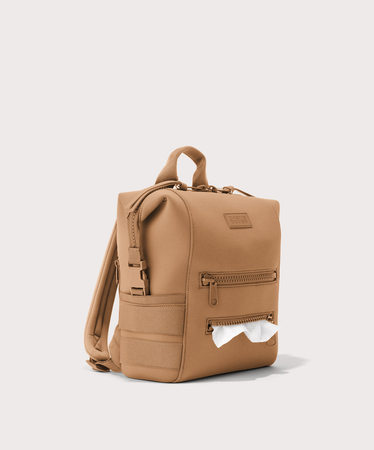 Tan backpack on a light gray background