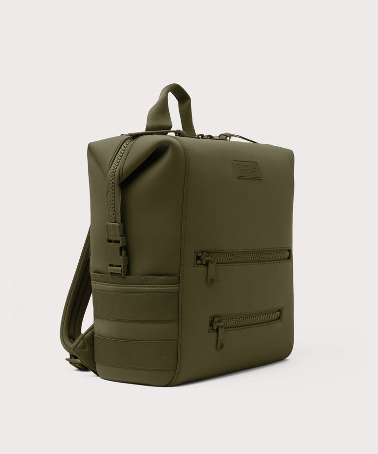 Green backpack on a light gray background