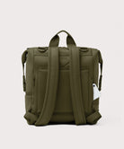 Green backpack on a light gray background