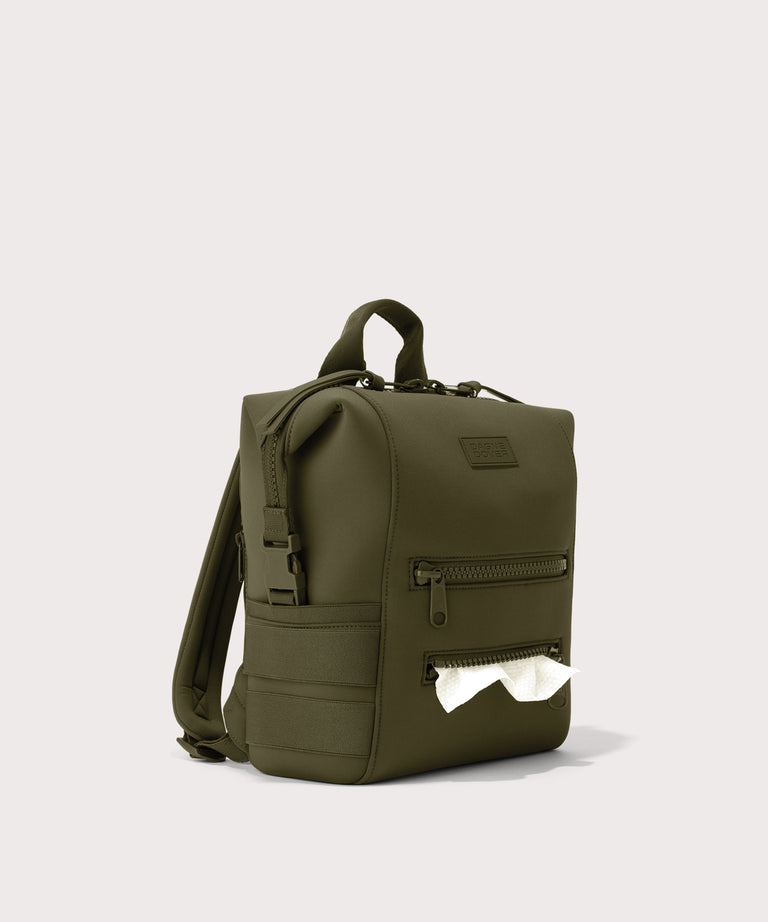 Green backpack on a light gray background
