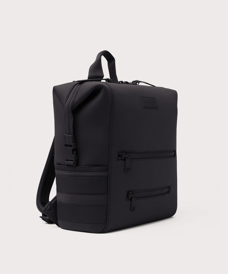 Black backpack on a light gray background