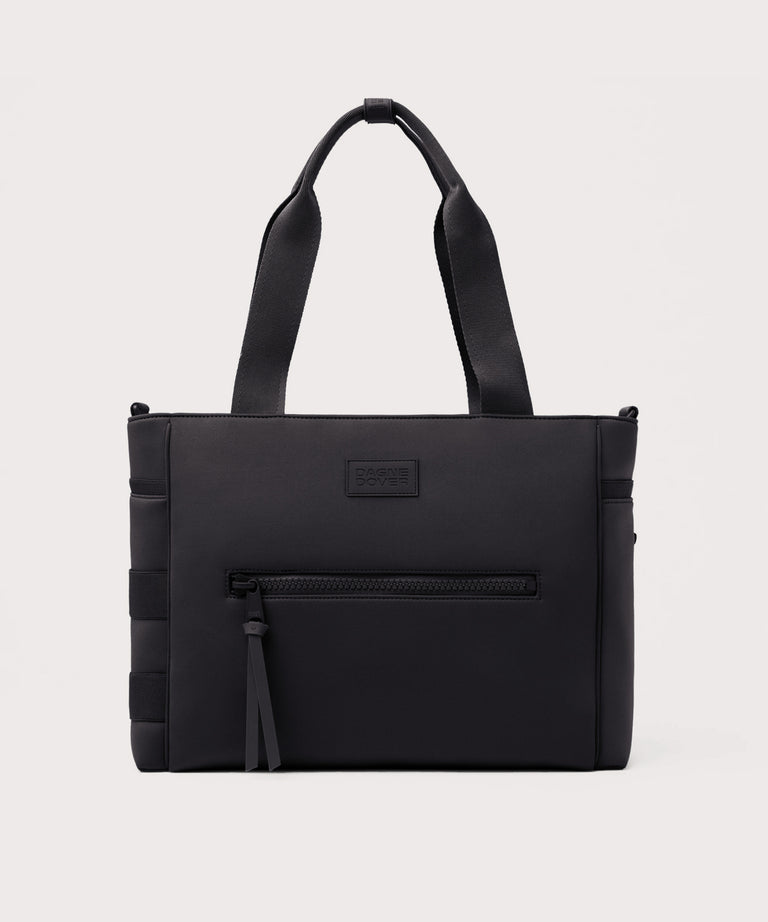 Black tote bag with a visible brand label on a white background