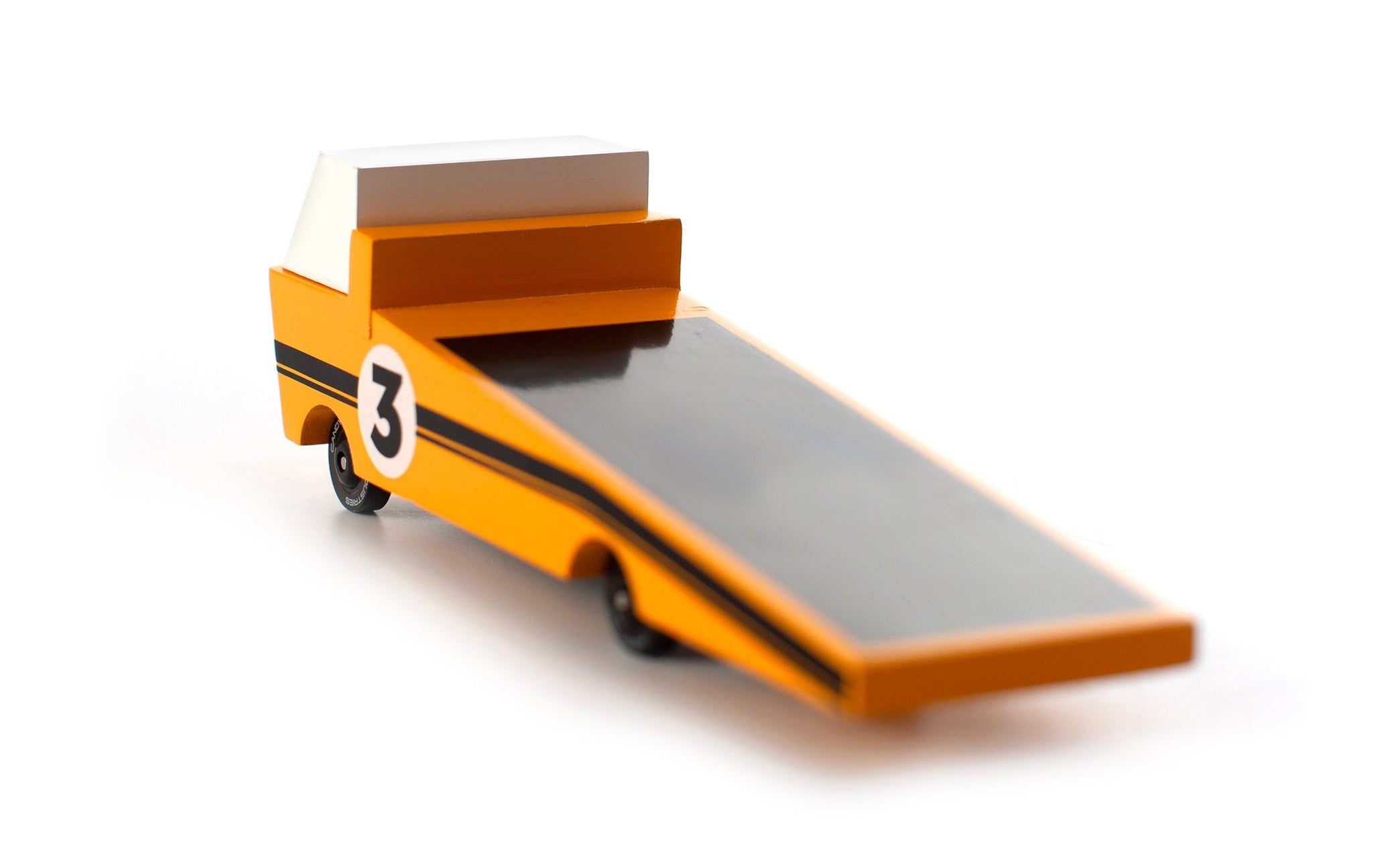 Toy car with a flatbed and number 3 on a white background