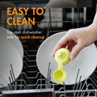 Hand placing a yellow dishwashing tablet into a dishwasher with text 'Easy to Clean' and 'Top rack dishwasher safe for quick cleanup'.