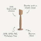 Silicone spatula with text highlighting features on a white background
