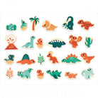 Set of colorful dinosaur and plant stickers on a white background