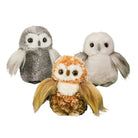 Three plush owl toys in different colors: one gray and white, one orange and brown, and one white and gray, arranged together on a plain white background.