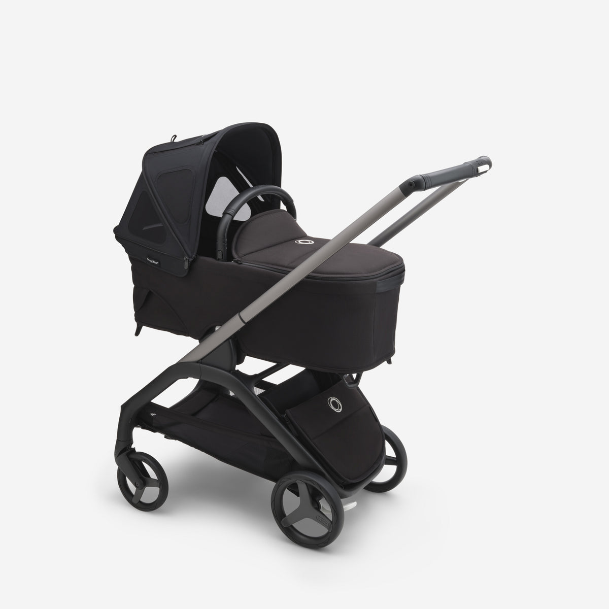 Black stroller with a matching bassinet on a white background