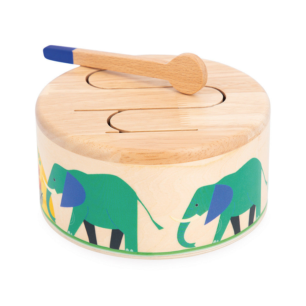 Wooden toy with elephant design and wooden mallet on a white background